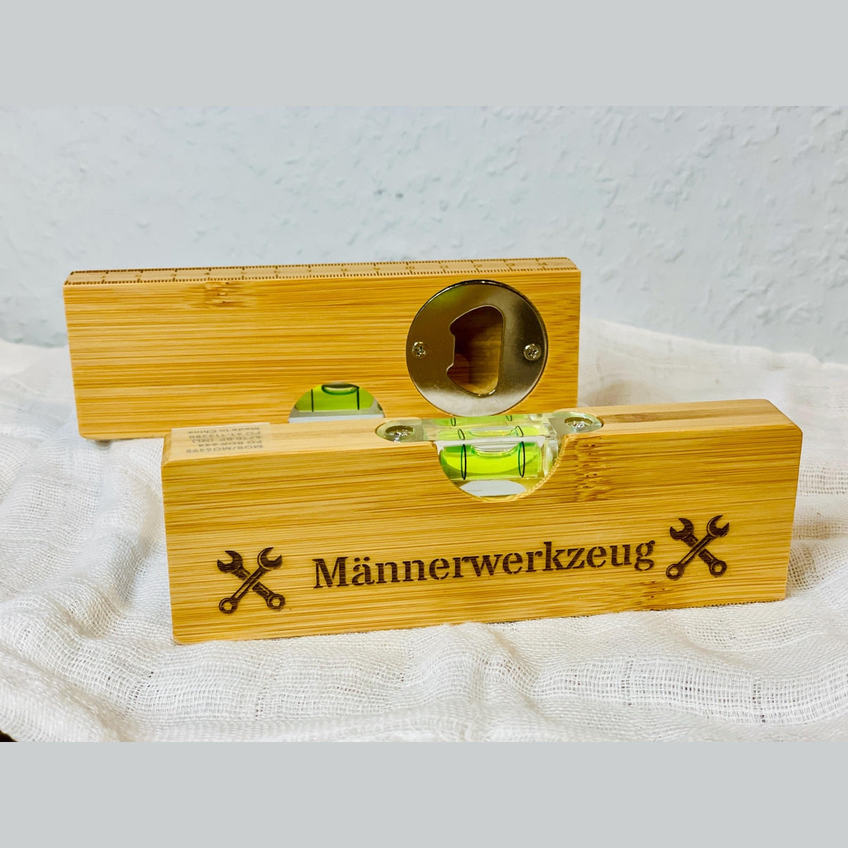 Multifunktionale Wasserwaage mit Zentimetermaß und Flaschenöffner Werkzeug Das Glückswerk