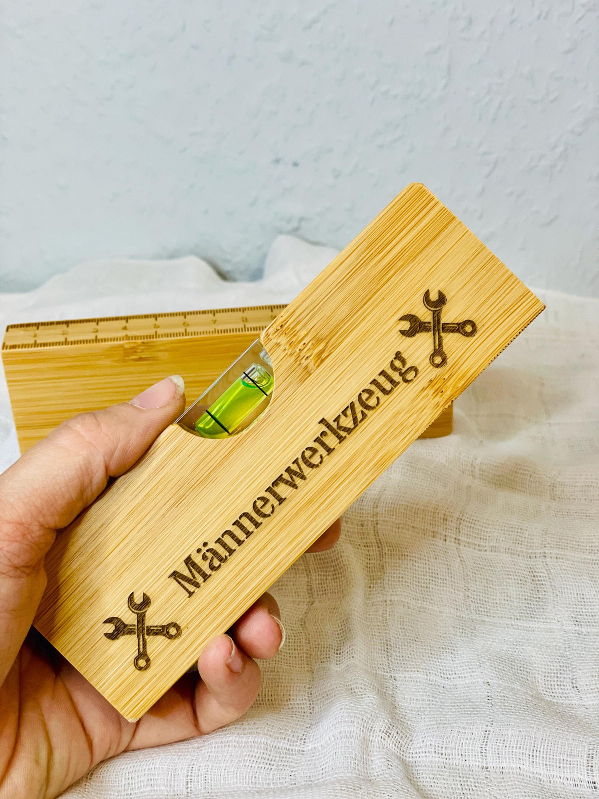 Personalisierte Wasserwaage Holz mit Wunschtext, Das Glückswerk