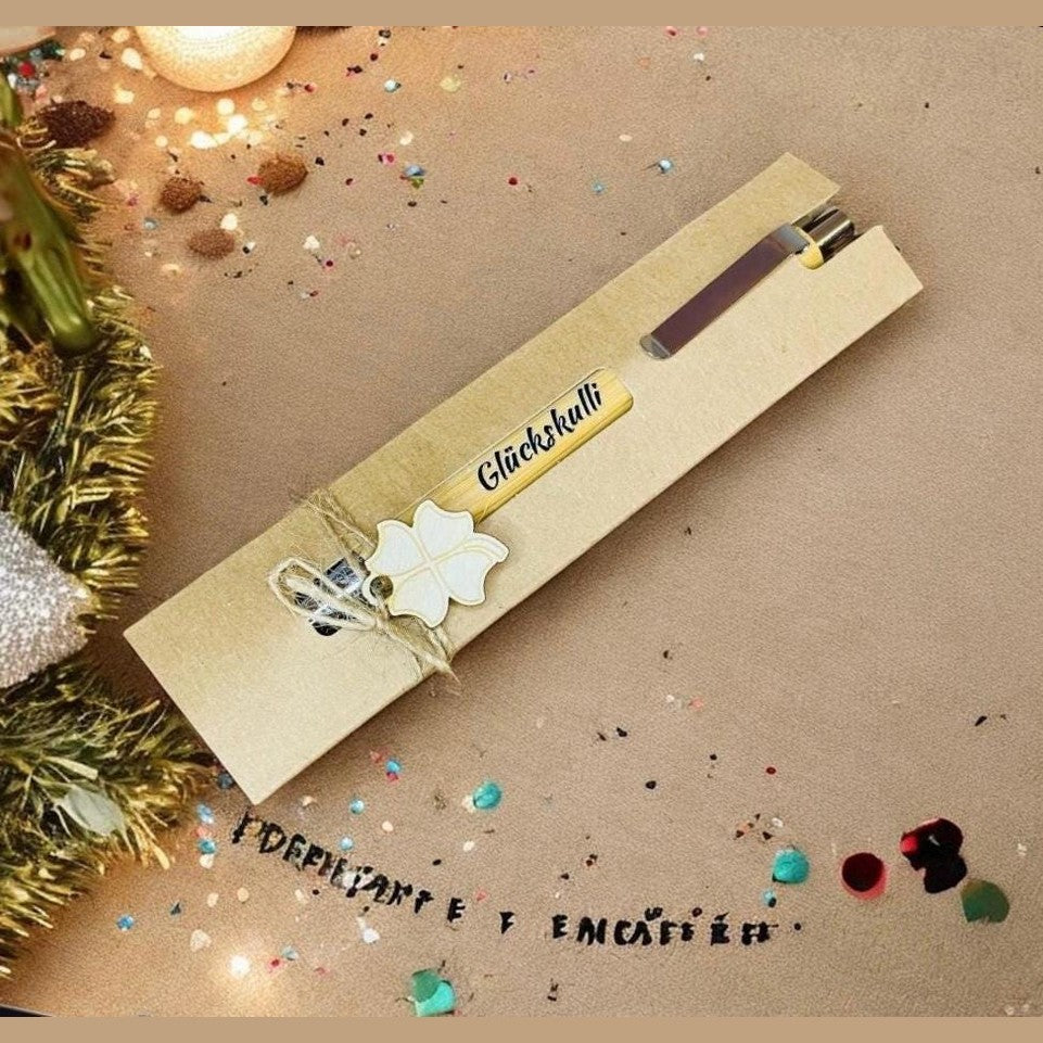 Kugelschreiber Glückskulli mit Geschenkverpackung und glücksklee Kugelschreiber Das Glückswerk