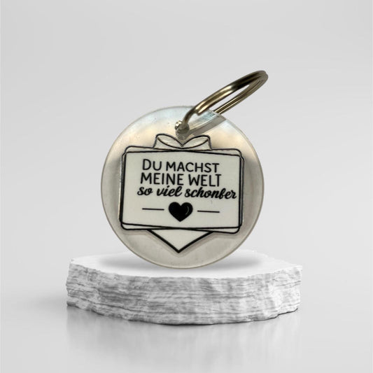 Schlüsselanhänger "Du machst meine Welt so viel schöner" – Liebevolles Geschenk aus klarem Acryl